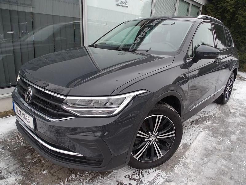 Grau Gebraucht 2023 VW Tiguan Active SUV | 25.490 € (Guter Preis) - Bild 1/4