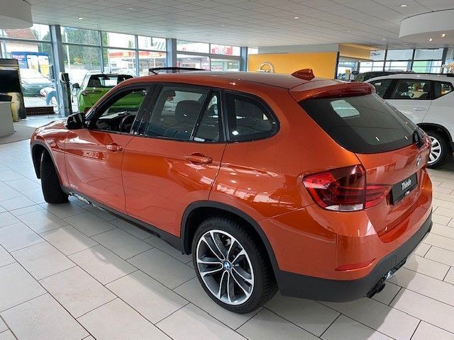 Gebraucht BMW X1 Shadowline 184 PS (135 kW) 2014 Valencia orange metallic SUV
