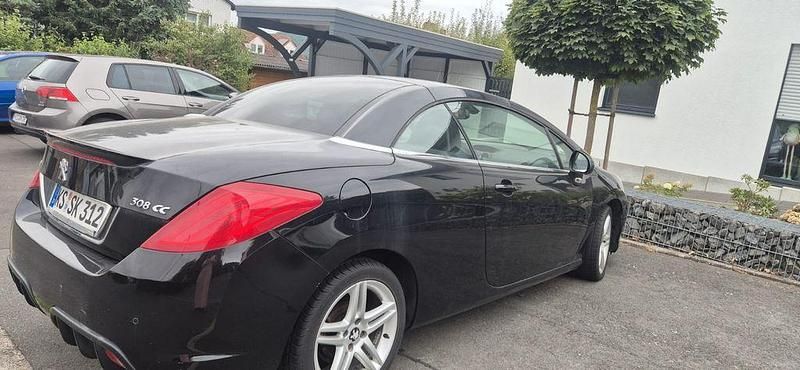 Schwarz Gebraucht 2011 Peugeot 308 CC Platinum Cabrio | 6.099 € (Fairer Preis) - Bild 1/4