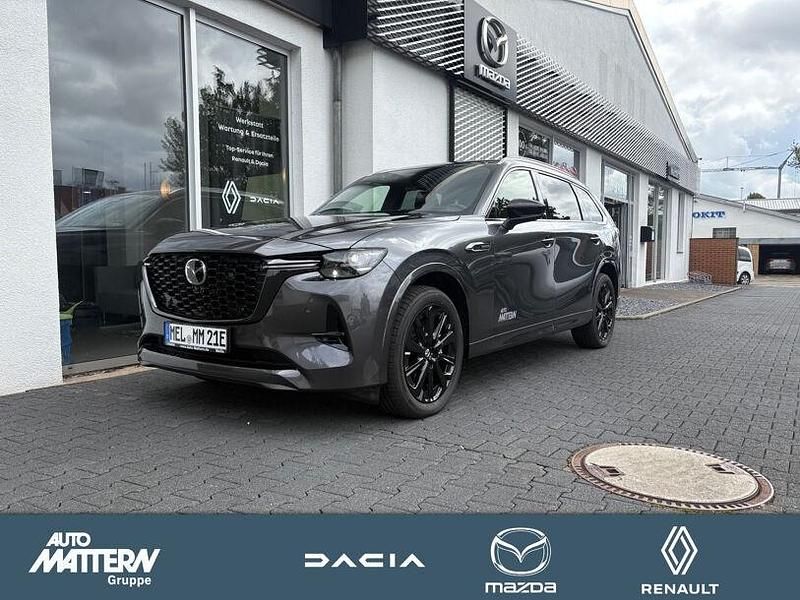 Machine gray Gebraucht 2024 Mazda CX-80 Homura-Line SUV | 52.590 € (Fairer Preis) - Bild 1/4