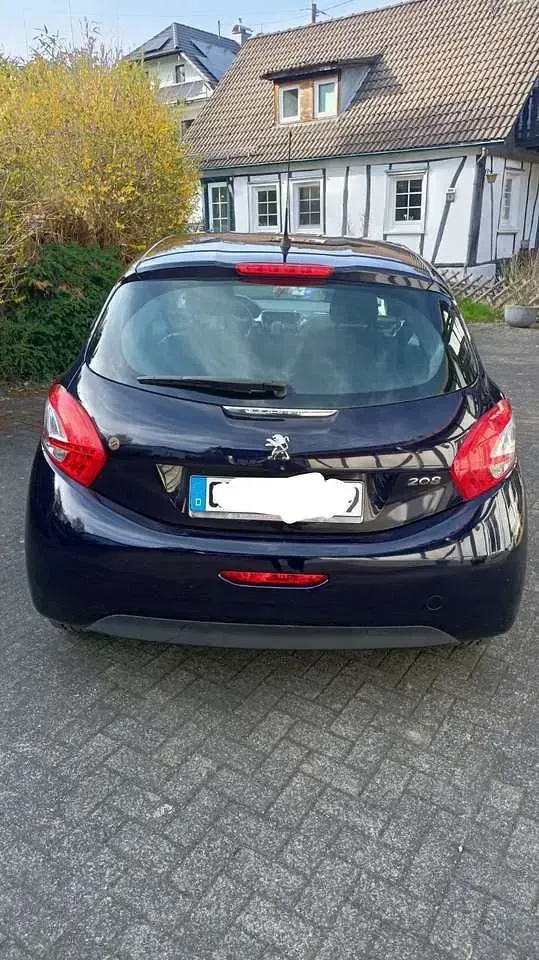 Gebraucht Peugeot 208 68 PS (50 kW) 2014 Blau Kleinwagen