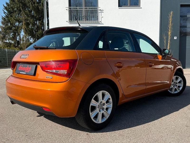 Gebraucht Audi A1 Sportback Attraction 86 PS (63 kW) 2013 Orange Kleinwagen