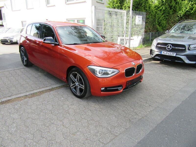 Orange Gebraucht 2013 BMW 118 Sport Line Kleinwagen | 7.990 € (Fairer Preis) - Bild 1/4