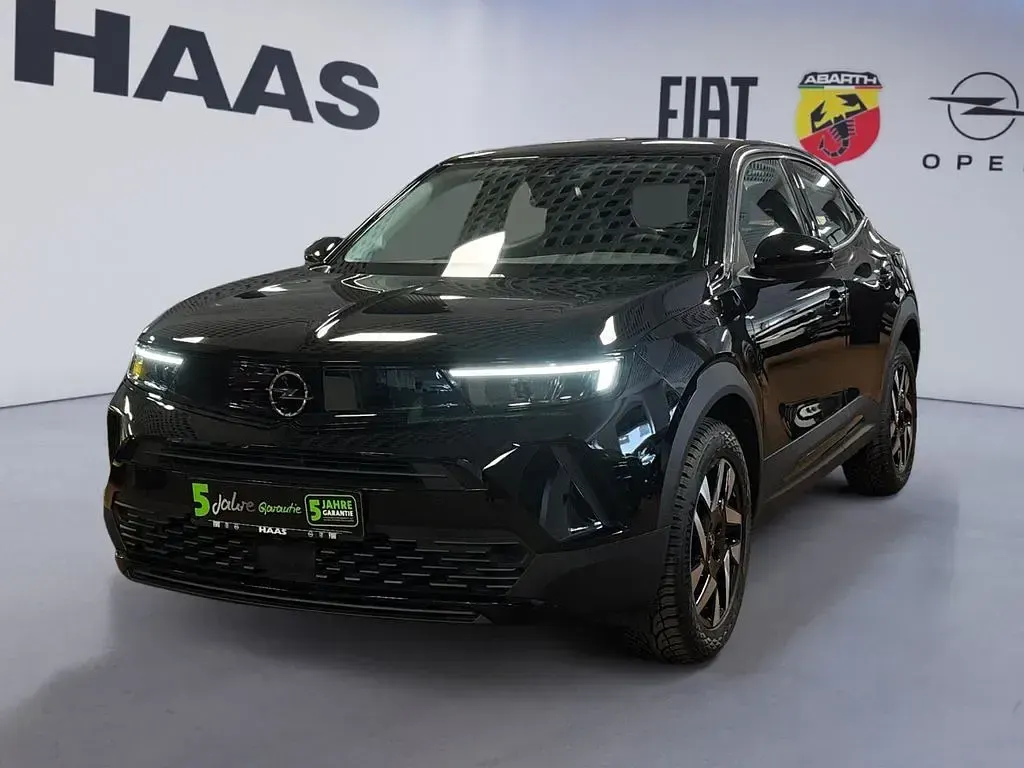 Gebraucht Opel Mokka Elegance 101 PS (74 kW) 2024 Lackierung schwarz perla nera/ SUV