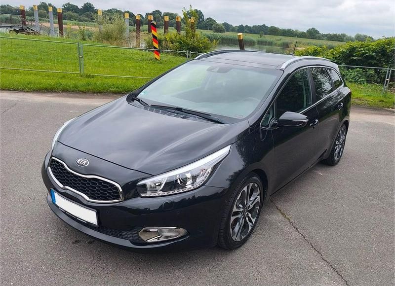 Schwarz Gebraucht 2014 Kia Ceed Sportswagon Platinum Kombi | 10.800 € (Fairer Preis) - Bild 1/4