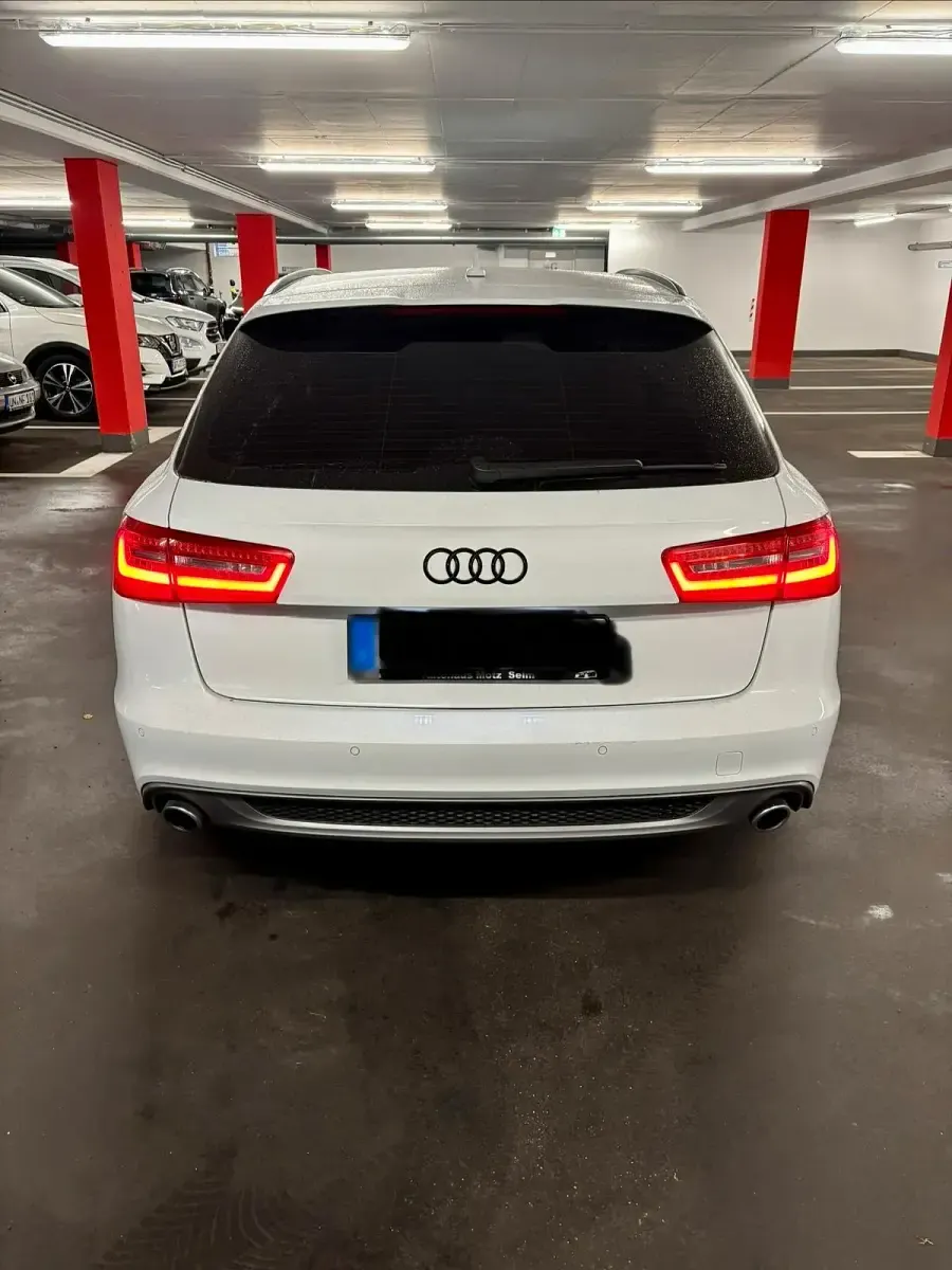 Second-hand Audi A6 313 CP (230 kW) 2014 Alb Break