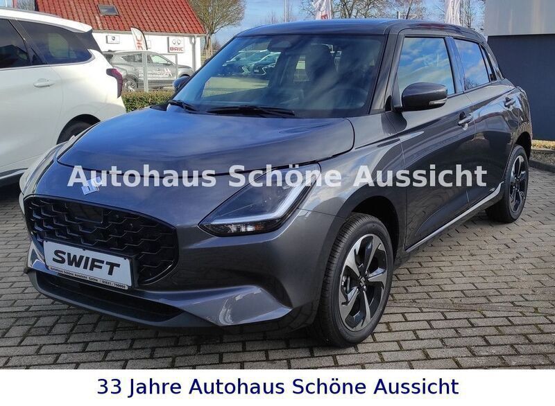 Grau Neu 2024 Suzuki Swift Comfort+ Limousine | 22.990 € - Bild 1/4