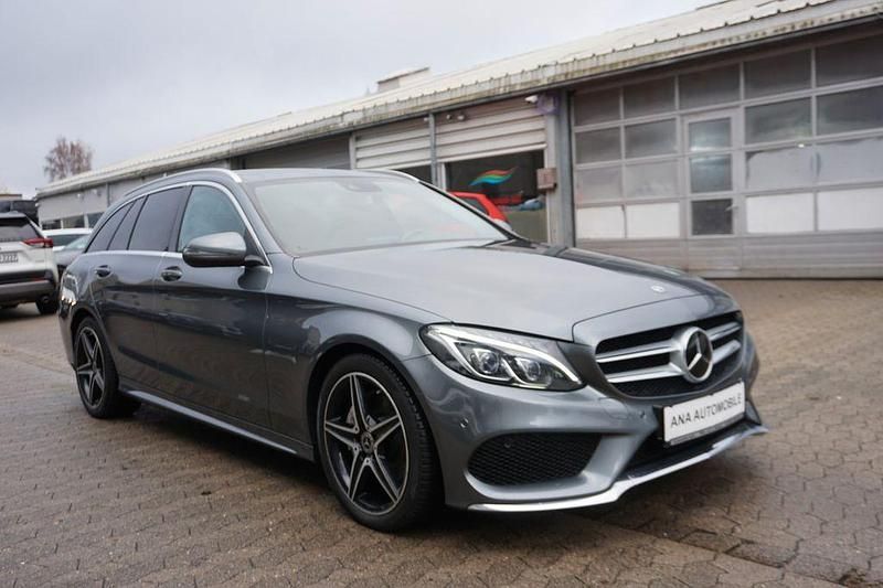 Grau Gebraucht 2018 Mercedes C220 AMG line Limousine | 15.499 € (Fairer Preis) - Bild 1/4