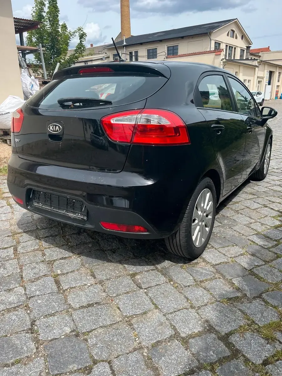 Gebraucht Kia Rio 86 PS (63 kW) 2011 Schwarz Kleinwagen
