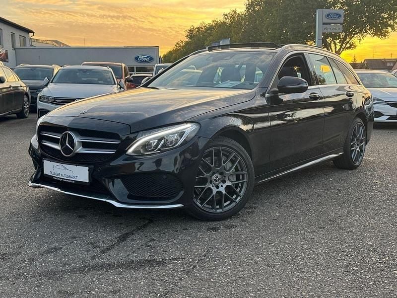 Schwarz Gebraucht 2018 Mercedes C250 AMG line Limousine | 15.890 € (Guter Preis) - Bild 1/4
