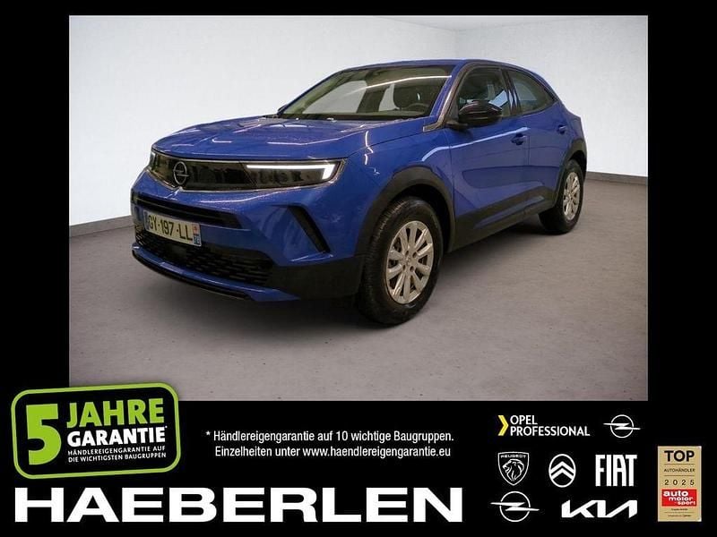 Lackierung voltaic blue met/ty Gebraucht 2024 Opel Mokka-e Edition SUV | 16.990 € (Superpreis) - Bild 1/4