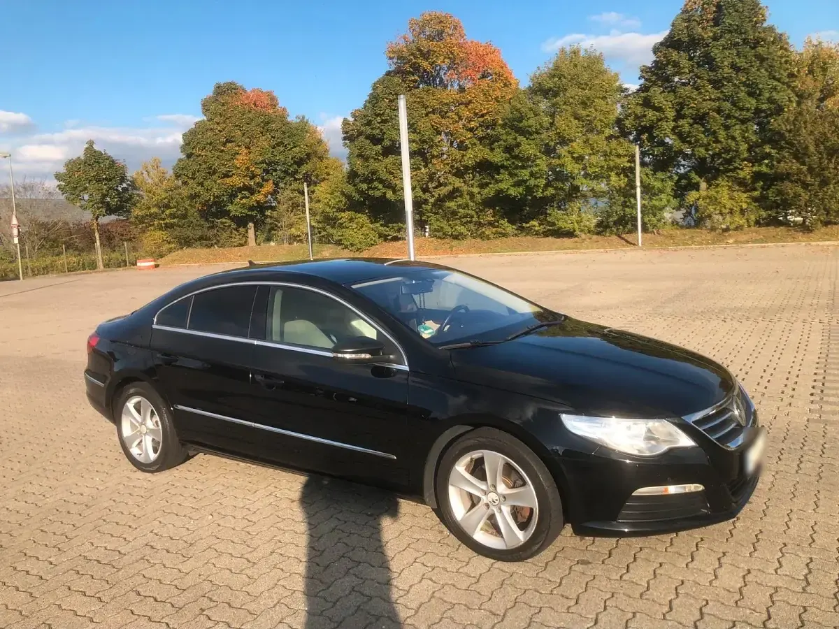 Second-hand VW Passat 160 CP (117 kW) 2010 Negru Berlinǎ