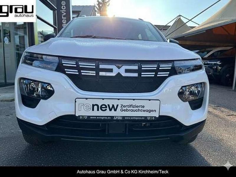 Kaolin weiß Gebraucht 2023 Dacia Spring Essentiel Kleinwagen | 13.990 € (Fairer Preis) - Bild 1/4