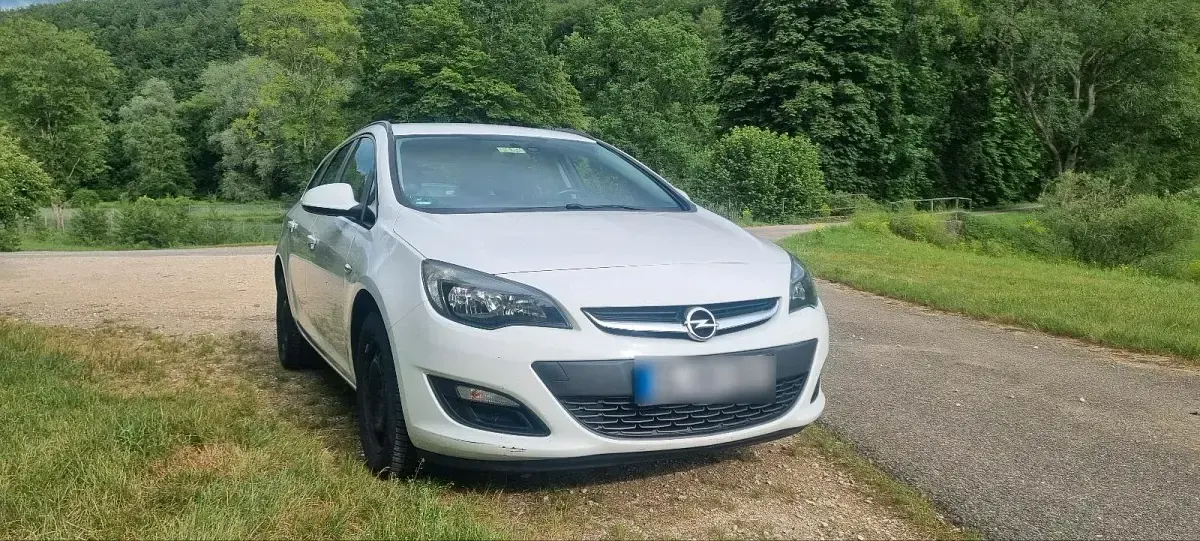 Gebraucht Opel Astra 110 PS (80 kW) 2015 Weiß Kombi