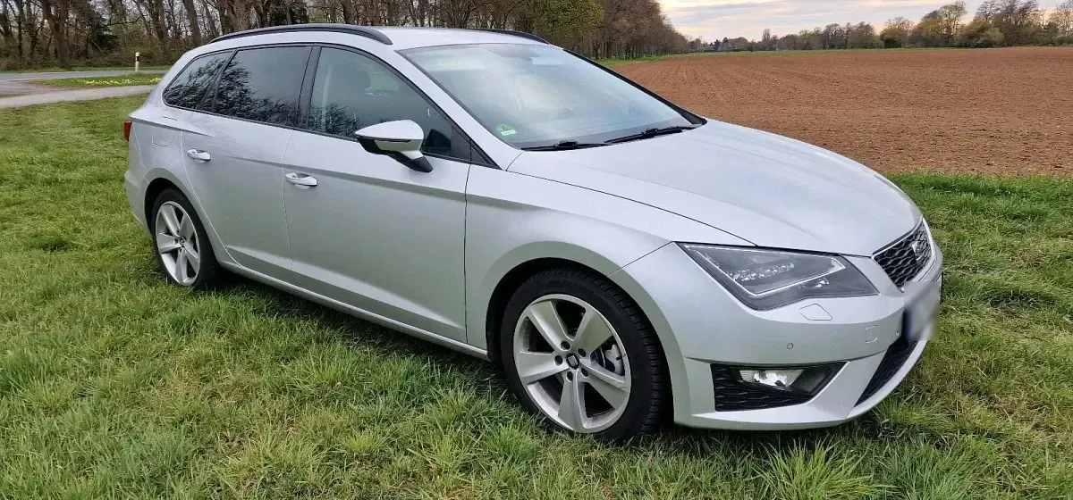 Używany Seat Leon 184 KM (135 kW) 2014 Pomarańczowy Kombi