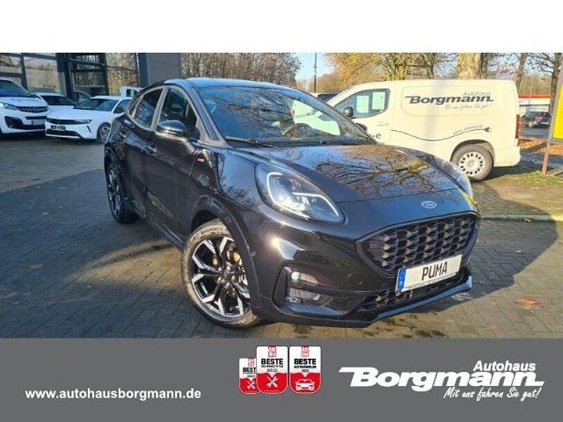 Obsidianschwarz metallic Gebraucht 2024 Ford Puma Gen-E ST-Line X Limousine | 27.890 € (Fairer Preis) - Bild 1/4