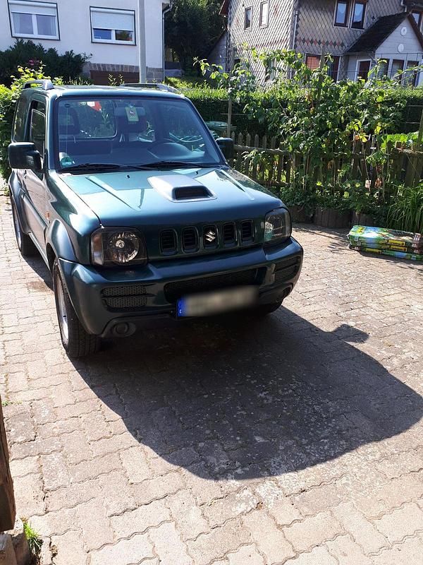 Grün Gebraucht 2007 Suzuki Jimny SUV | 4.150 € (Superpreis) - Bild 1/4