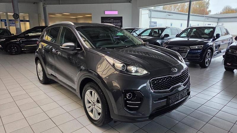 Grau Gebraucht 2018 Kia Sportage DREAM-TEAM Edition SUV | 14.499 € (Guter Preis) - Bild 1/4