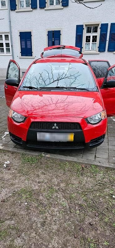 Gebraucht Mitsubishi Colt 75 PS (55 kW) 2009 Rot Kleinwagen