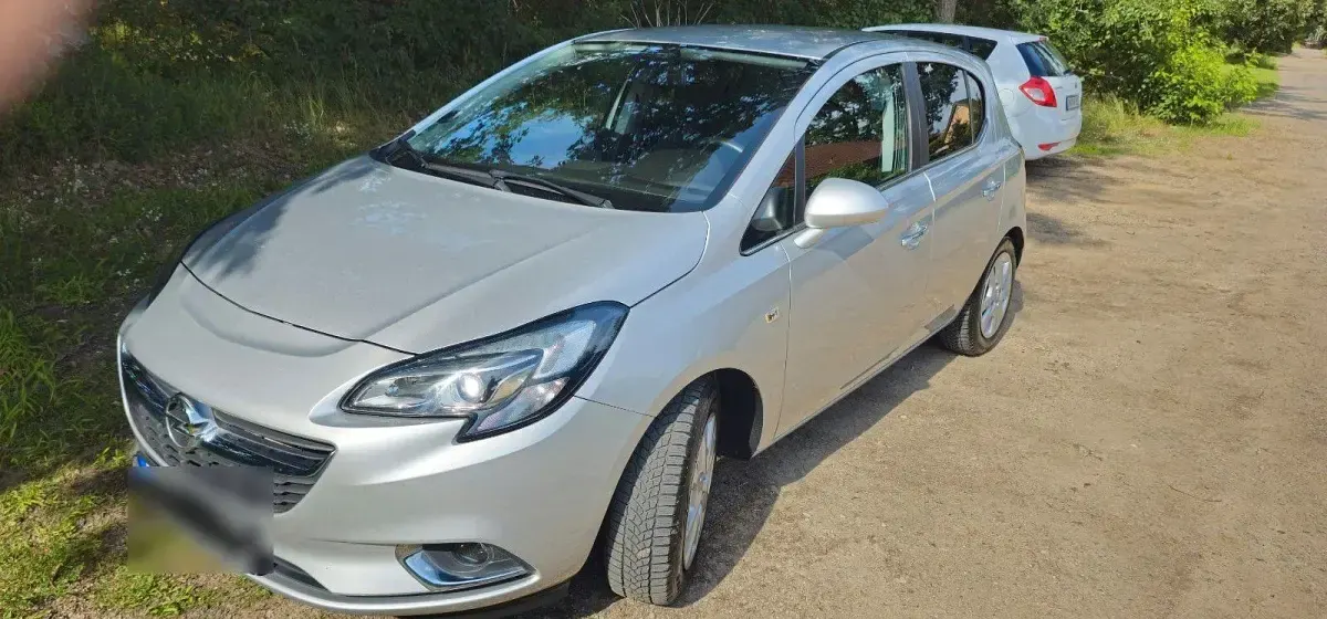 Gebraucht Opel Corsa Innovation 90 PS (66 kW) 2015 Silber Kleinwagen