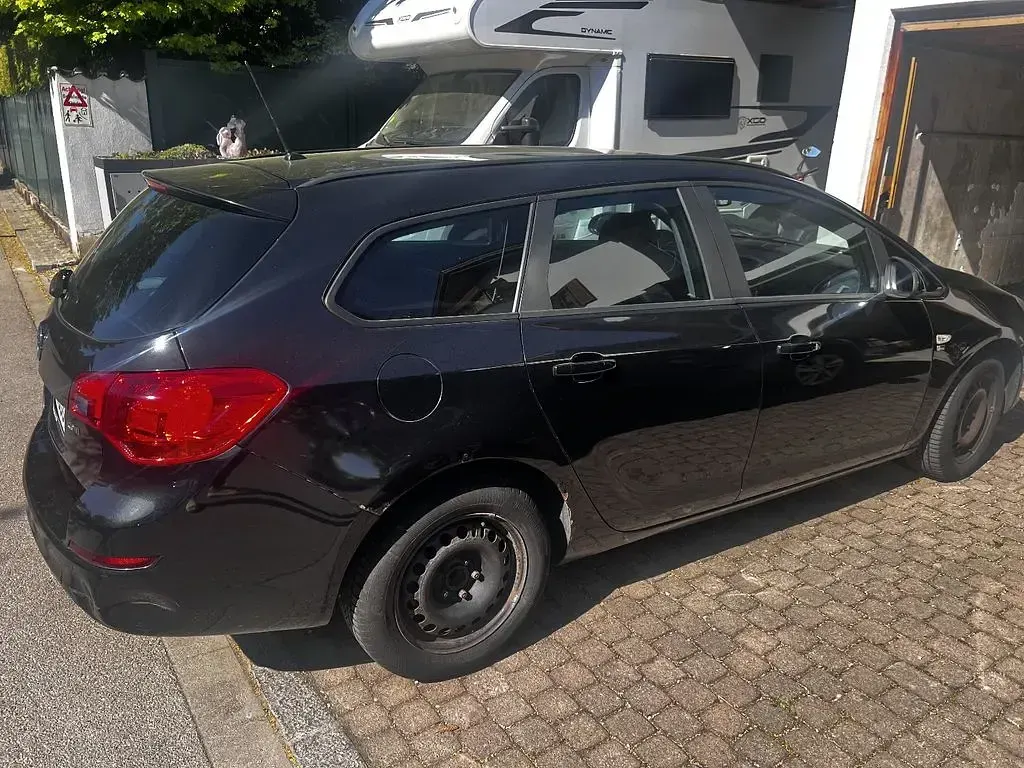 Gebraucht Opel Astra 125 PS (91 kW) 2012 Schwarz Kombi