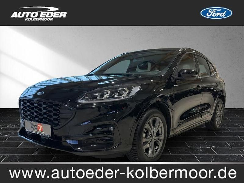 Obsidianschwarz (metallic) Gebraucht 2023 Ford Kuga ST-Line SUV | 27.690 € (Fairer Preis) - Bild 1/4