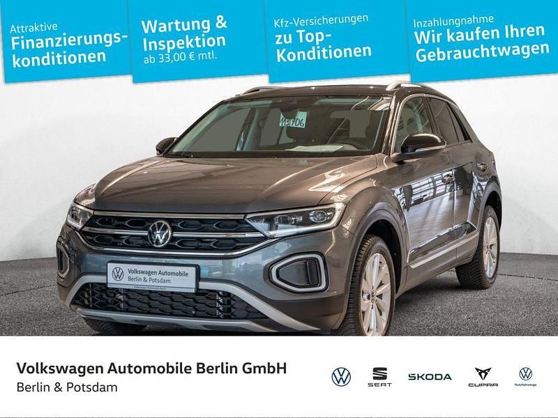 Indiumgrau metallic/schwarz Gebraucht 2024 VW T-Roc Style SUV | 29.950 € (Fairer Preis) - Bild 1/4
