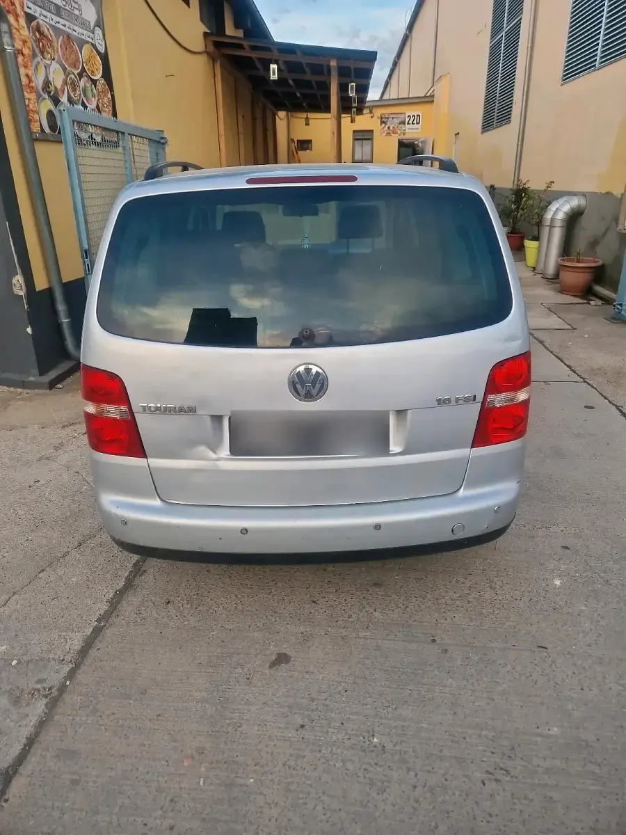Używany VW Touran 116 KM (85 kW) 2003 Szary Minivan