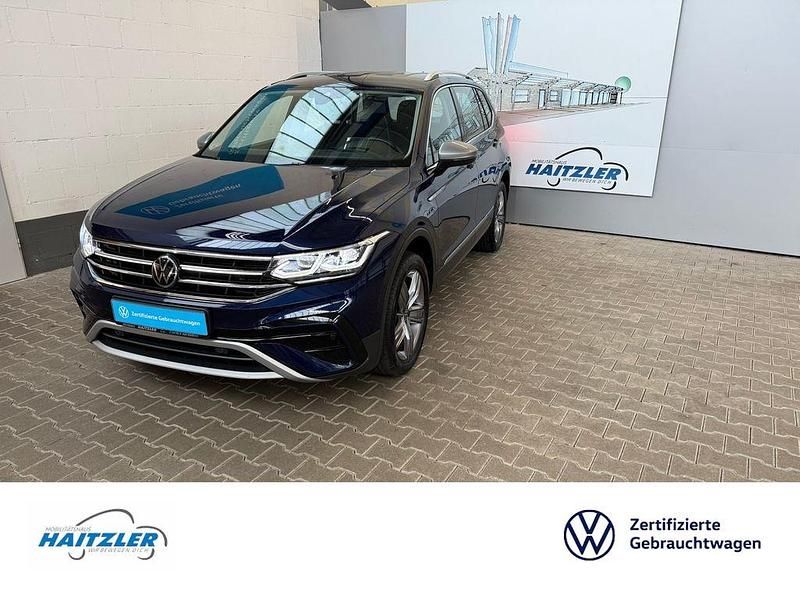 Atlantic blue metallic (metallic) Gebraucht 2022 VW Tiguan Allspace Elegance SUV | 33.890 € (Guter Preis) - Bild 1/4