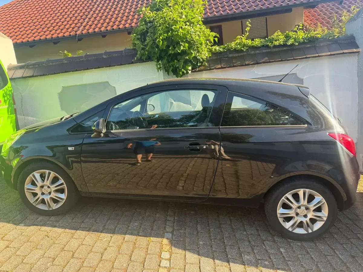 Gebraucht Opel Corsa 80 PS (58 kW) 2010 Schwarz Kleinwagen