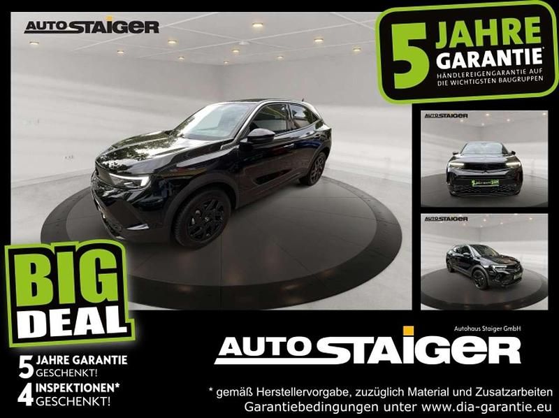 Lackierung schwarz perla nera/typ a Gebraucht 2024 Opel Mokka Ultimate SUV | 24.490 € (Fairer Preis) - Bild 1/4