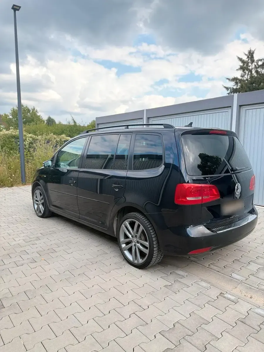 Gebraucht VW Touran 105 PS (77 kW) 2013 Schwarz Van / Kleinbus