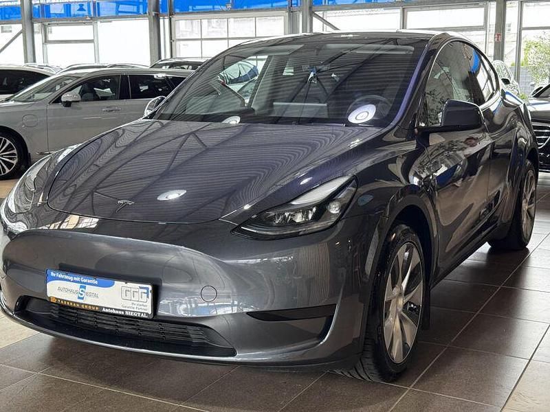 Gebraucht Tesla Model Y 255 kW (347 PS) 2023 Grau grau SUV