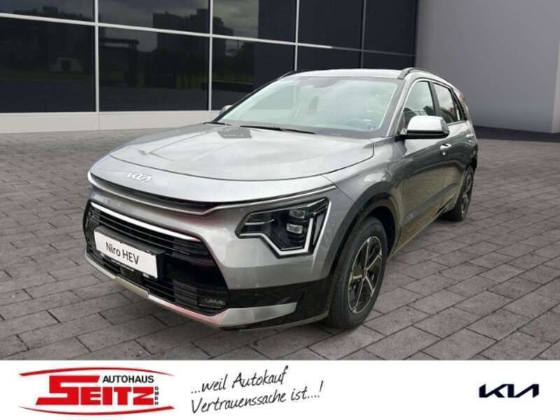 Stahlgrau Gebraucht 2024 Kia Niro Comfort SUV | 29.580 € (Superpreis) - Bild 1/3
