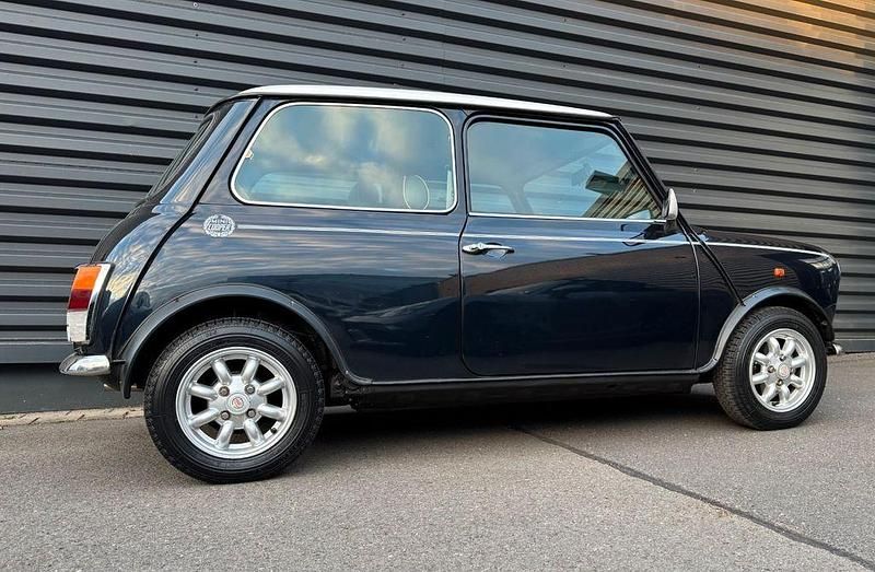 Gebraucht Mini Cooper 63 PS (46 kW) 1999 Schwarz Kleinwagen