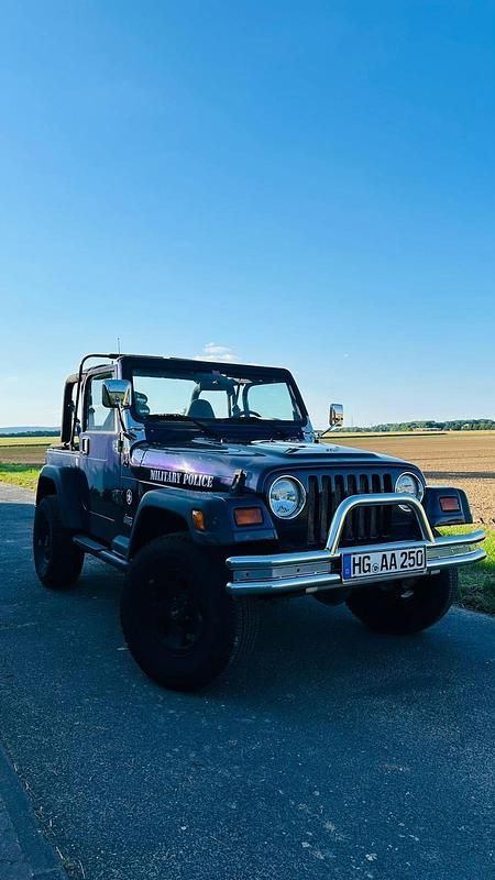 Violet Gebraucht 1999 Jeep Wrangler SUV | 15.999 € - Bild 1/4