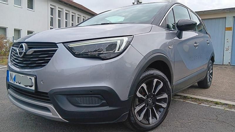 Grau Gebraucht 2021 Opel Crossland SUV | 14.799 € (Fairer Preis) - Bild 1/4