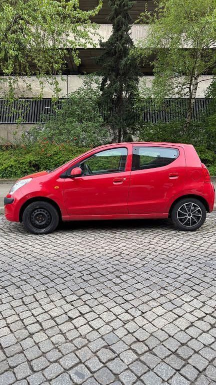 Gebraucht Nissan Pixo Acenta 68 PS (50 kW) 2011 Rot Kleinwagen