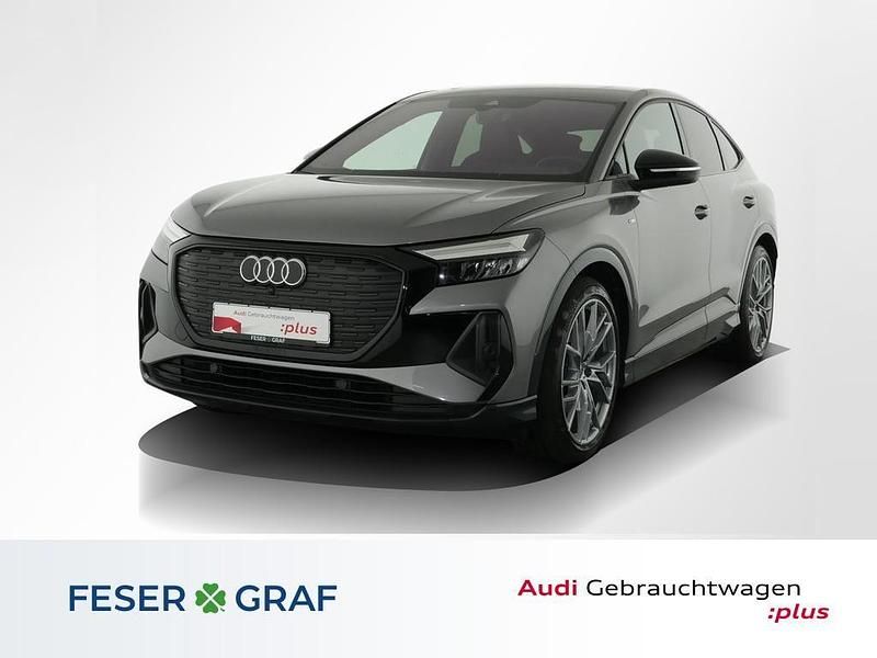 Taifungrau metallic Gebraucht 2022 Audi Q4 Sportback e-tron Ambiente SUV | 35.788 € (Fairer Preis) - Bild 1/4