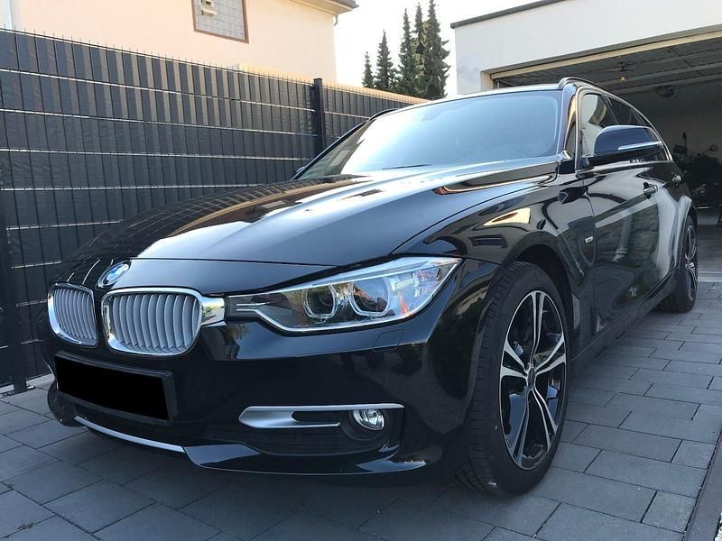 Gebraucht BMW 320 184 PS (135 kW) 2013 Schwarz Kombi