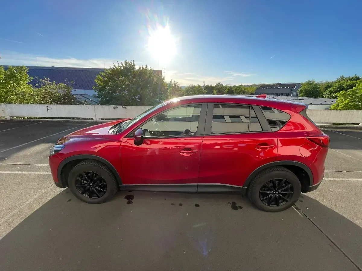 Second-hand Mazda CX-5 Exclusive-Line 160 CP (117 kW) 2015 Roșu SUV