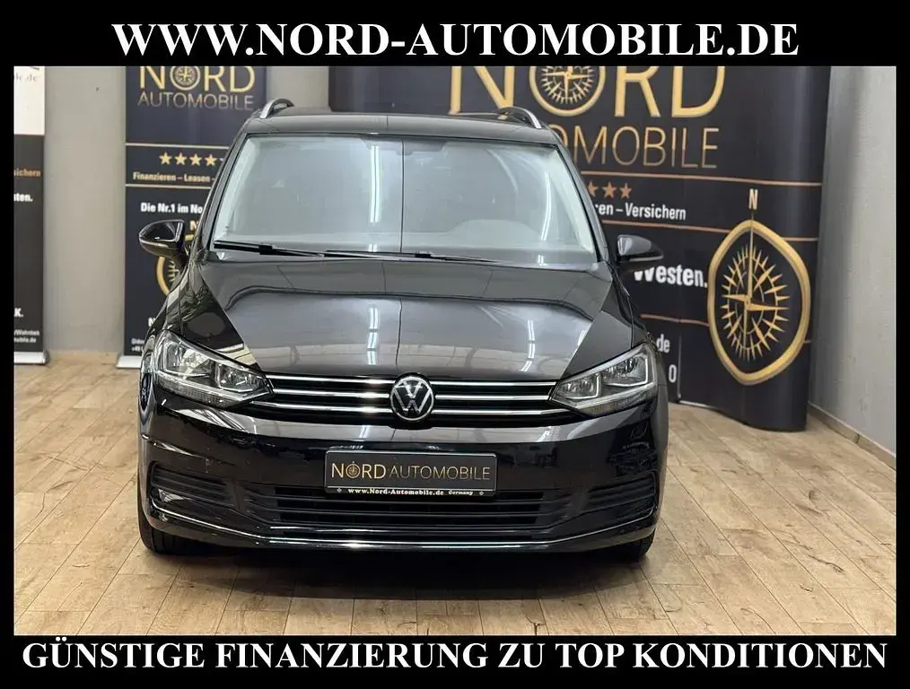 Używany VW Touran Active 150 KM (110 kW) 2021 Czarny Minivan