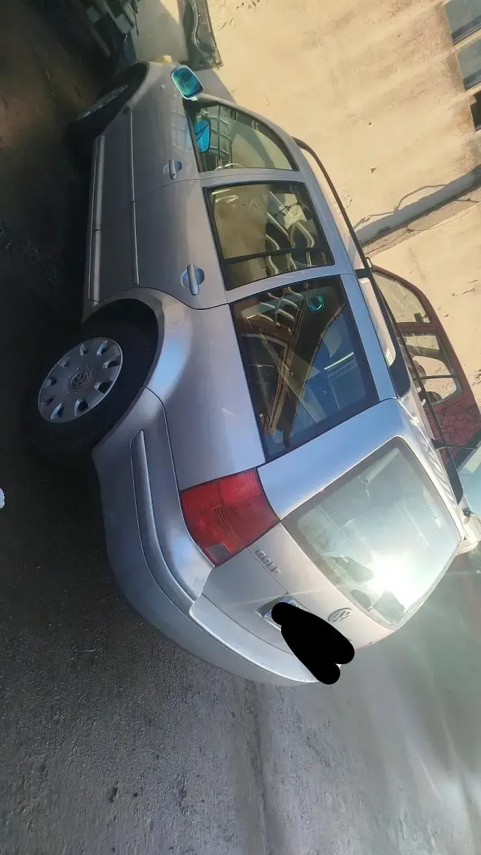Second-hand VW Golf IV 105 CP (77 kW) 2001 Argintiu Break