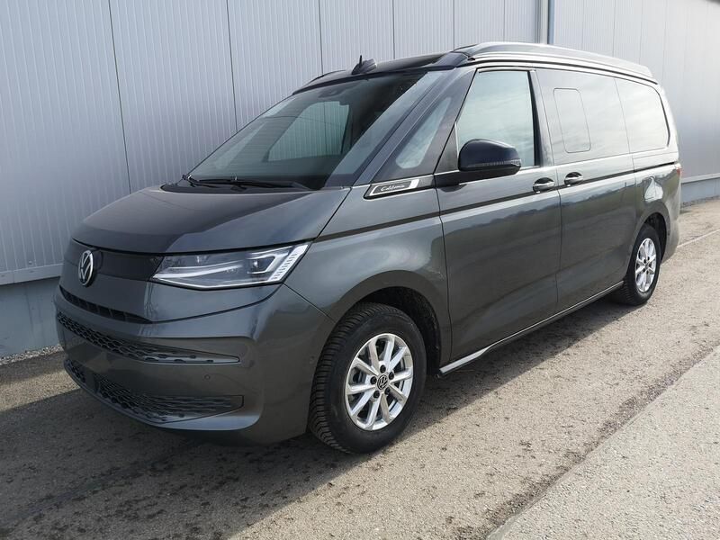 Gebraucht VW T7 Comfortline 150 PS (110 kW) 2024 Mediumblau metallic dach schwarz Van