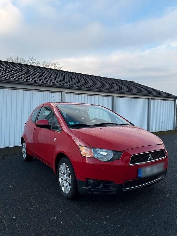 Gebraucht Mitsubishi Colt 95 PS (69 kW) 2011 Rot Kleinwagen
