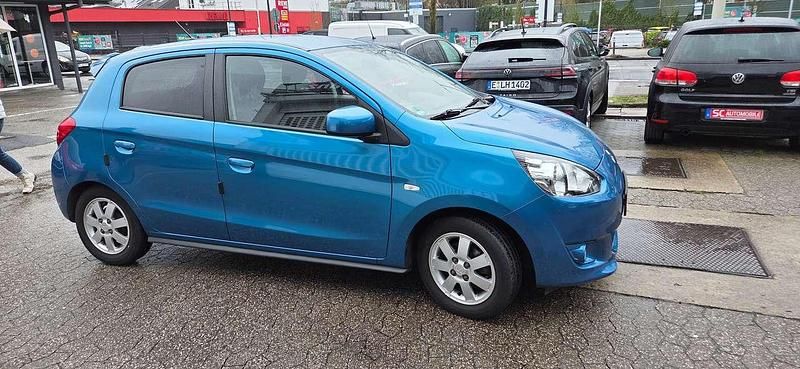 Gebraucht Mitsubishi Space Star Top 80 PS (58 kW) 2015 Atollblau (p) Kleinwagen