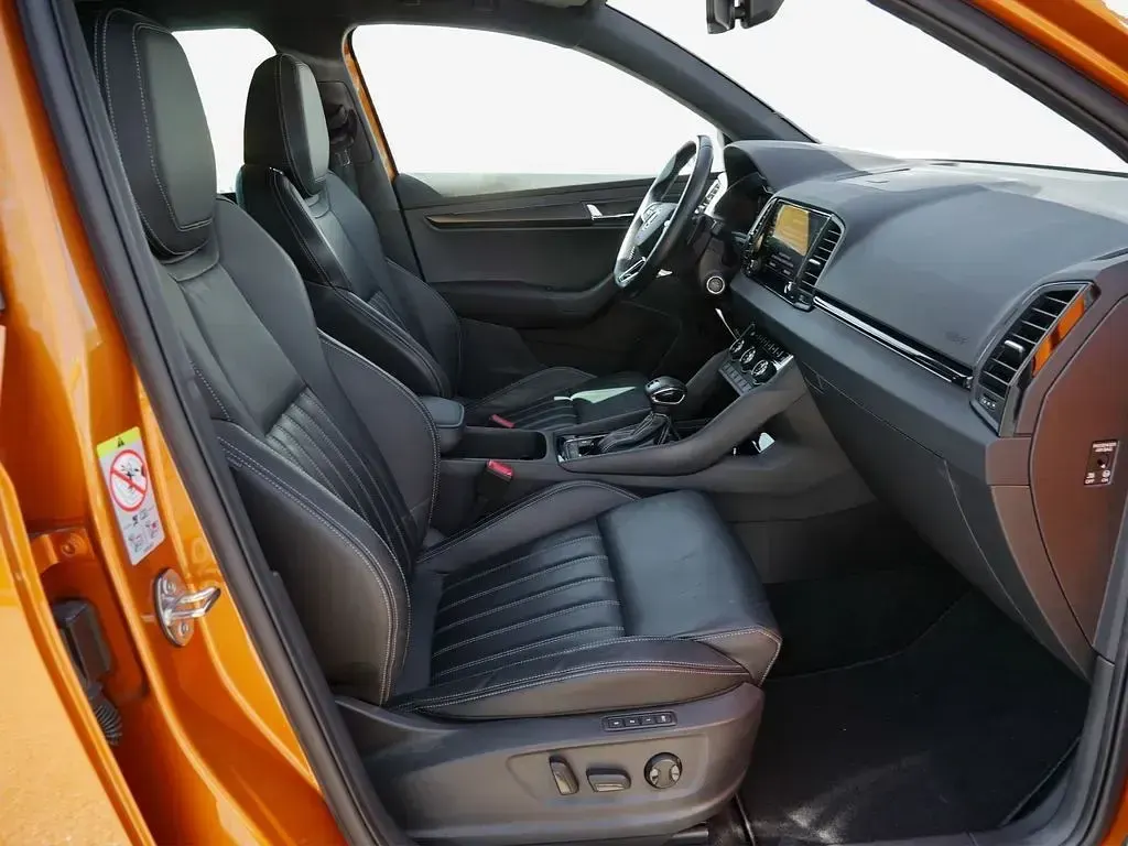 Gebraucht Skoda Karoq SportLine 190 PS (139 kW) 2022 Phoenixorange metallic SUV
