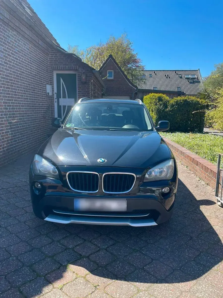 Second-hand BMW X1 148 CP (108 kW) 2011 Negru SUV