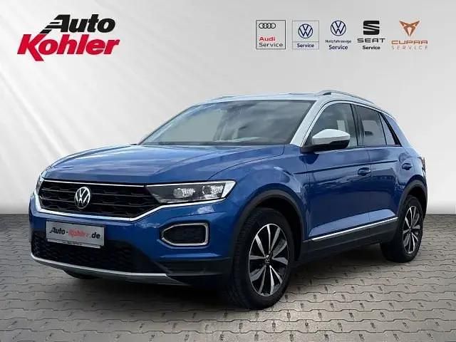 Ravennablau metallic Gebraucht 2022 VW T-Roc Style SUV | 20.880 € (Fairer Preis) - Bild 1/4