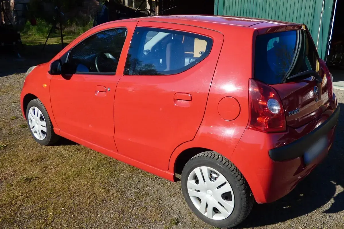 Gebraucht Nissan Pixo 68 PS (50 kW) 2009 Rot Kleinwagen